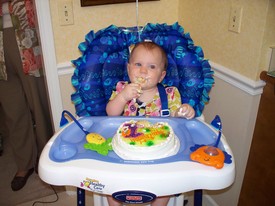 Sat 27 Mar 2010 03:06:44 PM

Gracie enjoys her birthday cake.